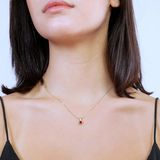 Square pendant with emerald