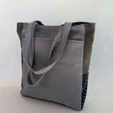 Gray and striped pattern Tote Bag