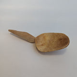 Carved wooden pendant