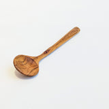 Carved wooden pendant