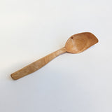 Carved wooden pendant