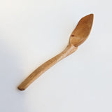 Carved wooden pendant