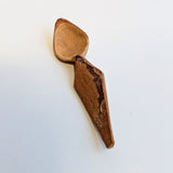 Carved wooden pendant