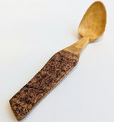 Carved wooden pendant