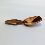 Carved wooden pendant