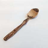 Carved wooden pendant