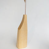Carved flat wooden vase