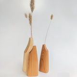 Carved flat wooden vase