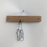shoes on a stick