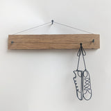 shoes on a stick